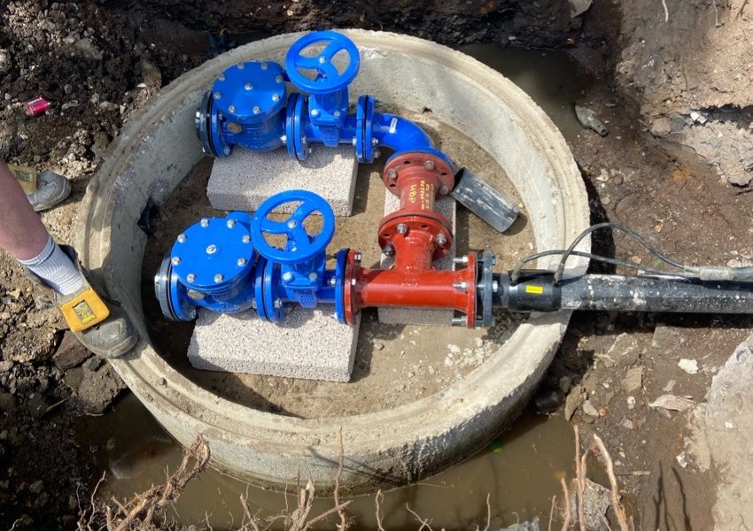 New gate valves and non-return valves installed in a valve chamber
